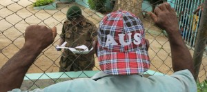 The electoral office was under tight security on election day as voters lined up to deal with last minute problems.