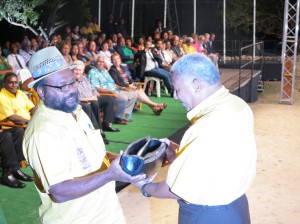 Commodore Bainimarama hands over the chairmanship of MSG to the FLNKS representative Victor Tutugoro at the opening ceremony, Noumea 2013.